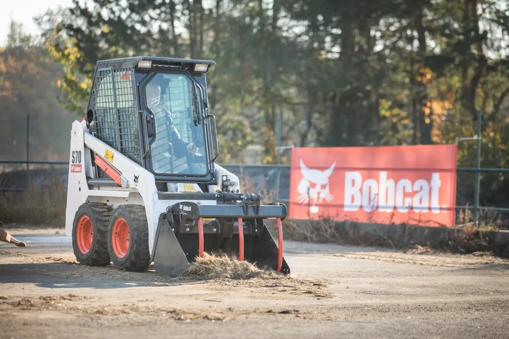 Bobcat S70 with grapple for farm work