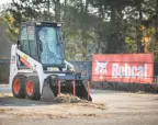 Bobcat S70 with grapple for farm work