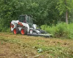 Bobcat S510 with brush cutter for forestry work